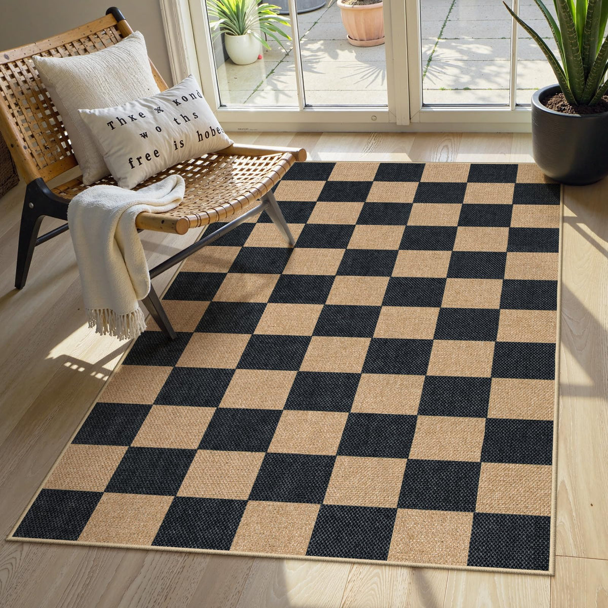 Lahome Colette checkered rug patio view showing neutral tones and non-slip backing.