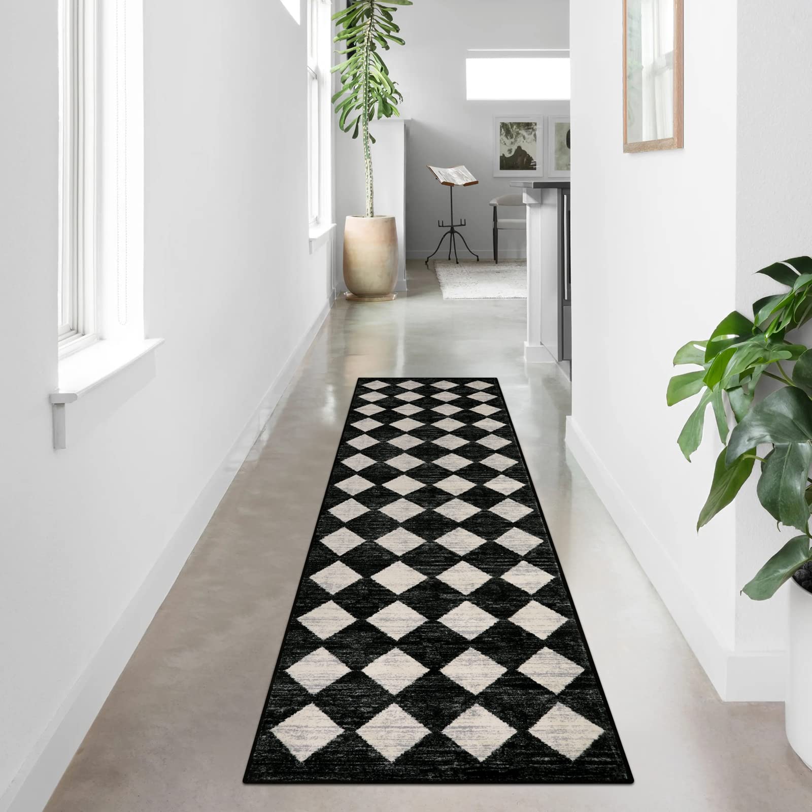 Lahome Moroccan Trellis Runner Rug in black with retro diamond pattern and rubber backing for safety.