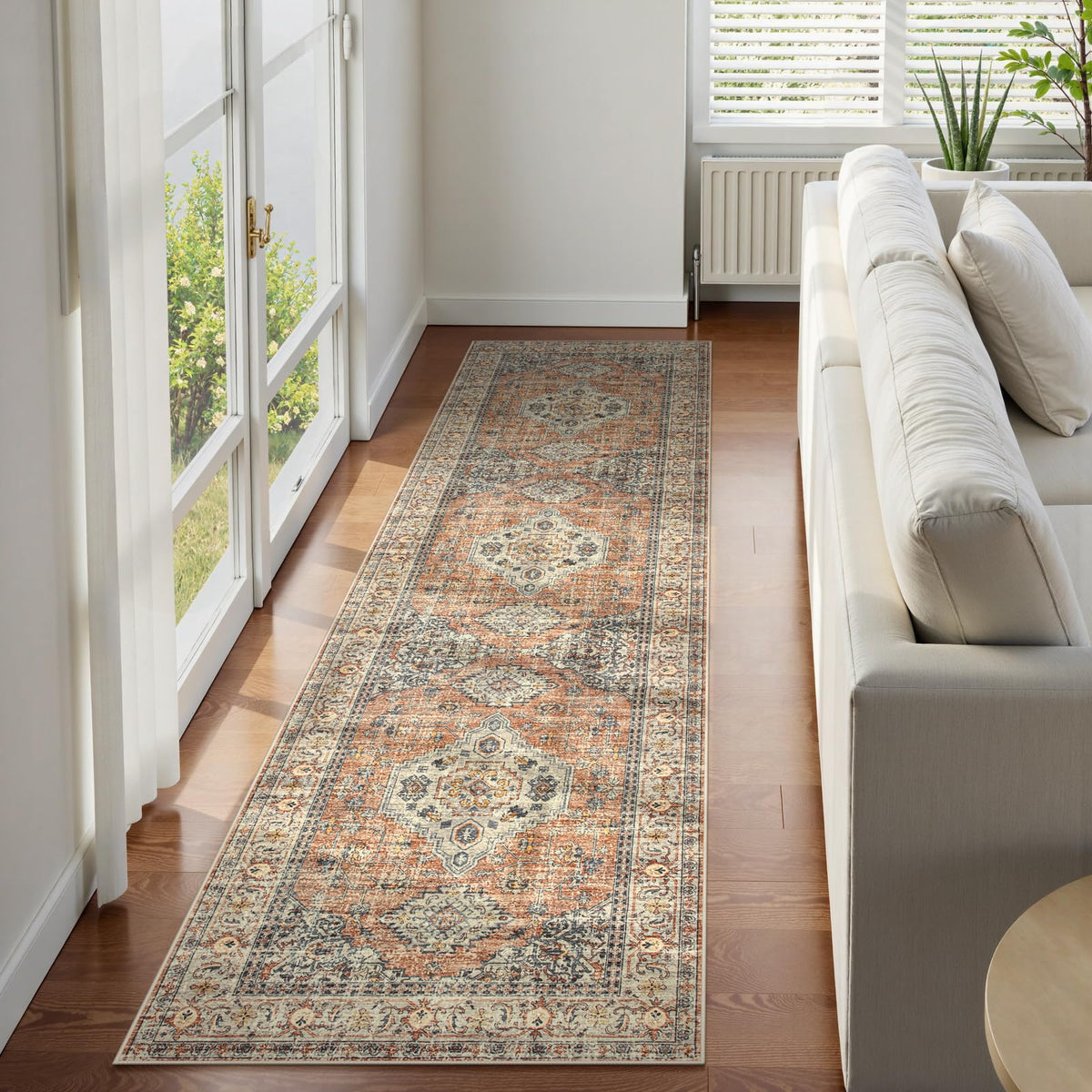 Lahome oriental hallway runner in peach orange adds warm color to your entryway.