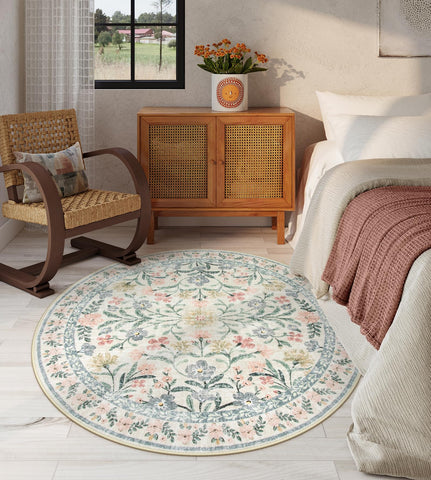 Lahome Sylvie round floral-pattern rug; vintage beige tones for dorm or reading nook.