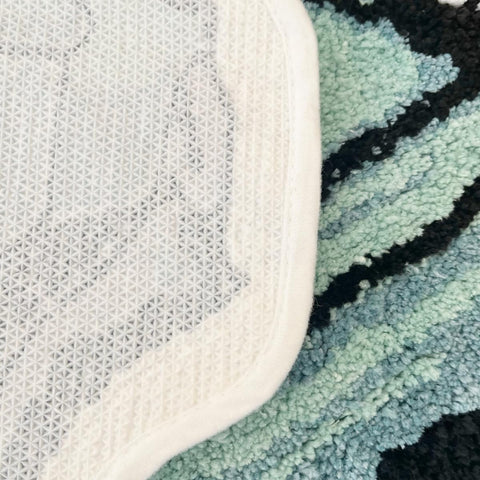 LAKEA Enthusiast green rug weave detail; plush flocking for comfortable daily use