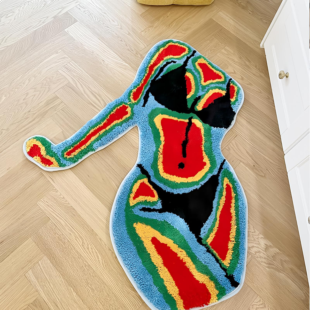 LAKEA heat-map silhouette rug adds bold color to modern living rooms.