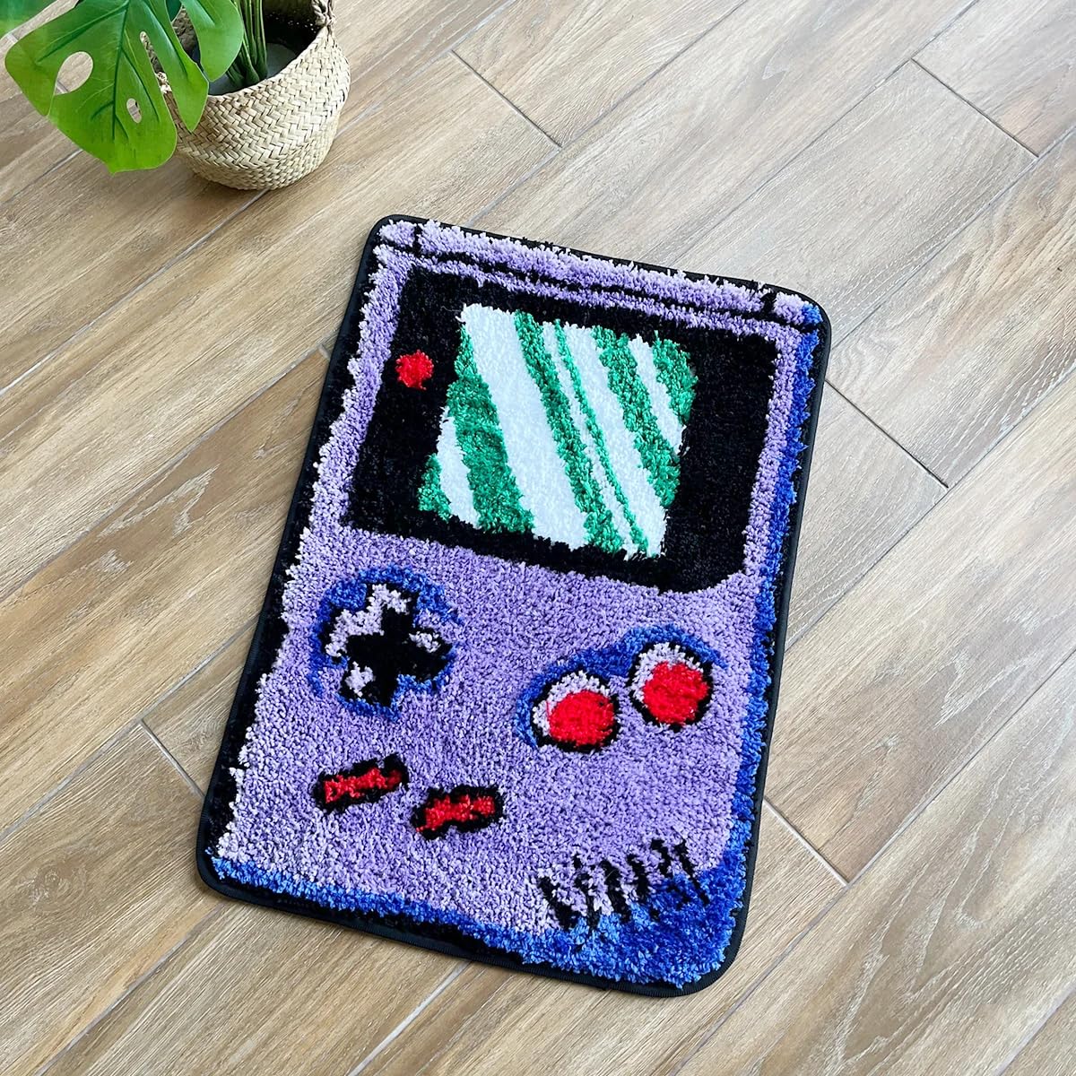 LAKEA purple games console rug with tufted finish for cozy play areas.