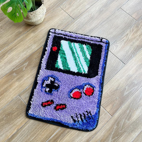 LAKEA purple games console rug with tufted finish for cozy play areas.