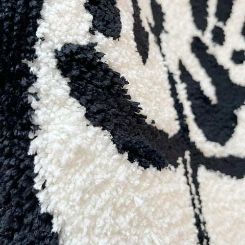 LAKEA Sexy Bathroom Tufted Rug placed in front of the sofa enhances seating area