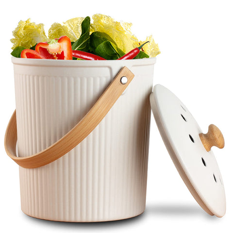 LALASTAR countertop compost bin with lid in cream for fresh kitchen odor control.