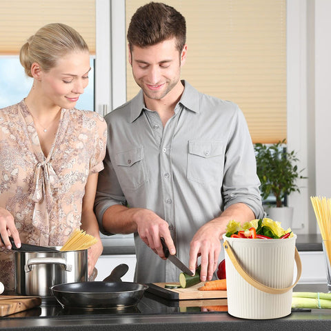 LALASTAR vented lid on bamboo fiber compost bin reduces smells in busy kitchens.