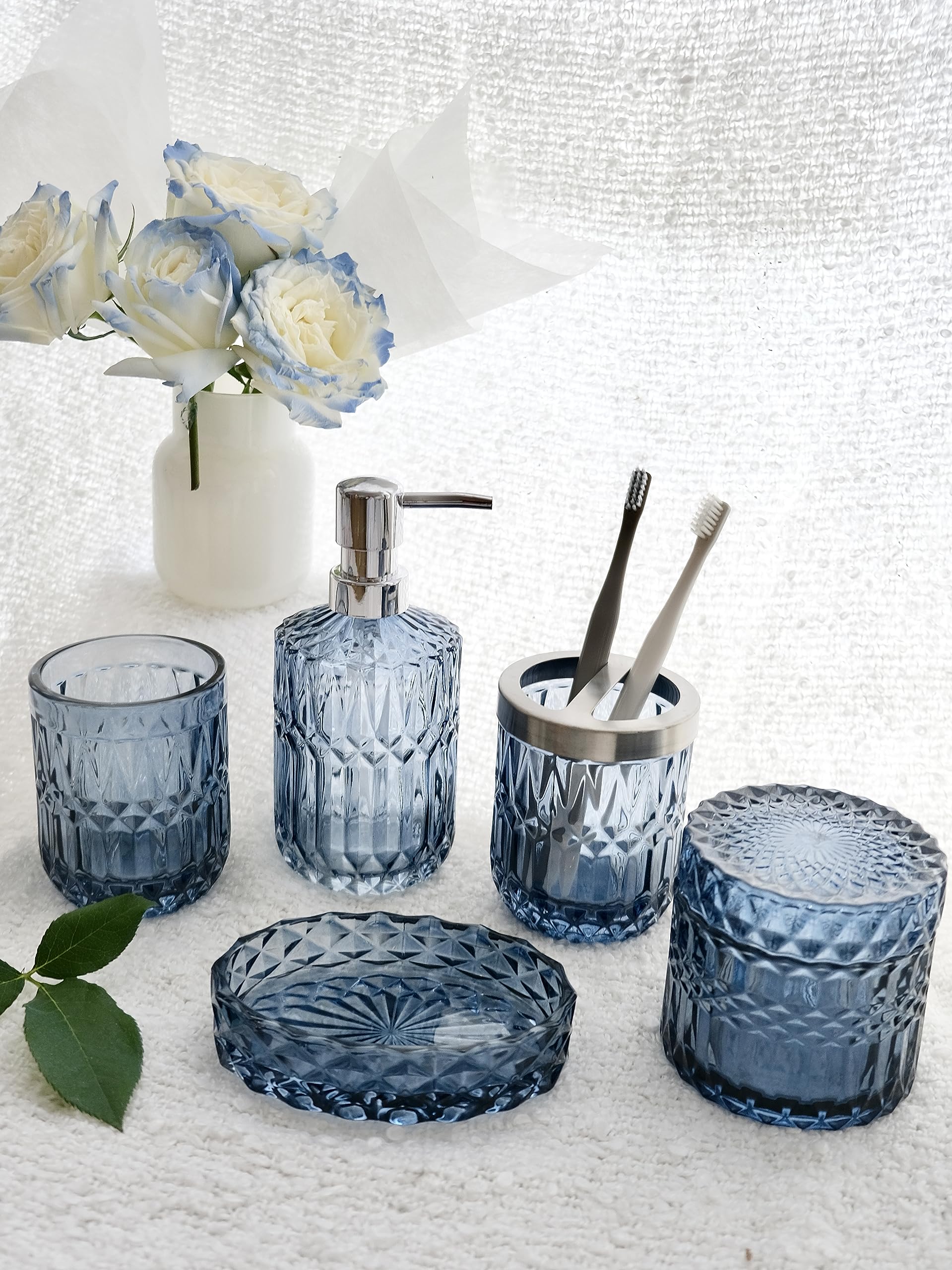 LaMarriti cotton swab jar stores q-tips neatly on the vanity.