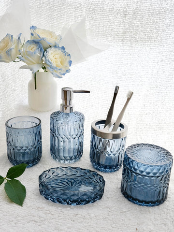 LaMarriti cotton swab jar stores q-tips neatly on the vanity.