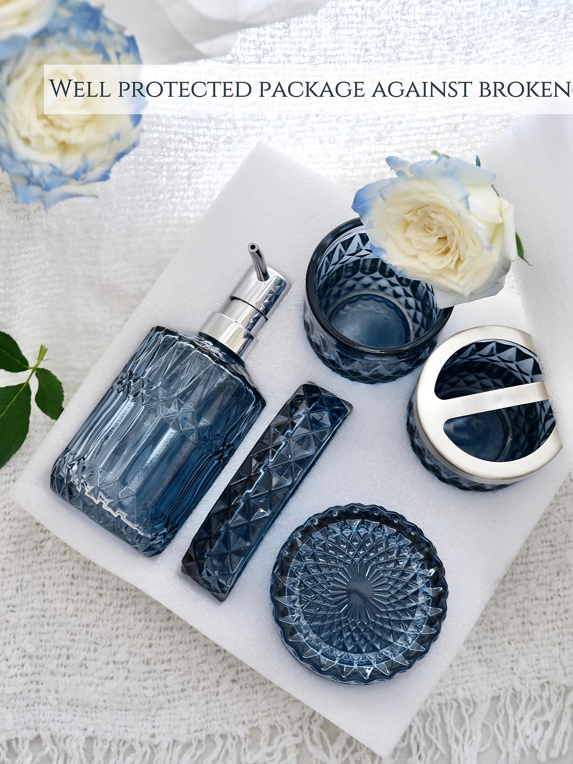 LaMarriti blue glass set elevates bathroom decor with crystal clarity.