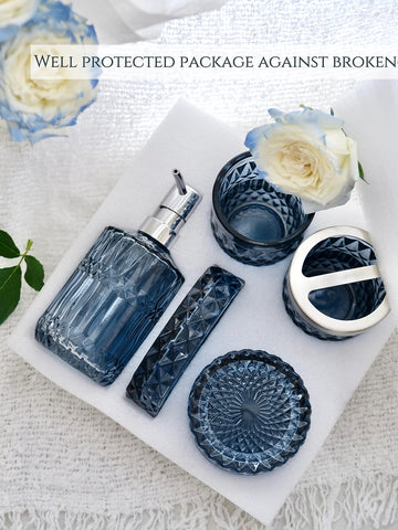 LaMarriti blue glass set elevates bathroom decor with crystal clarity.