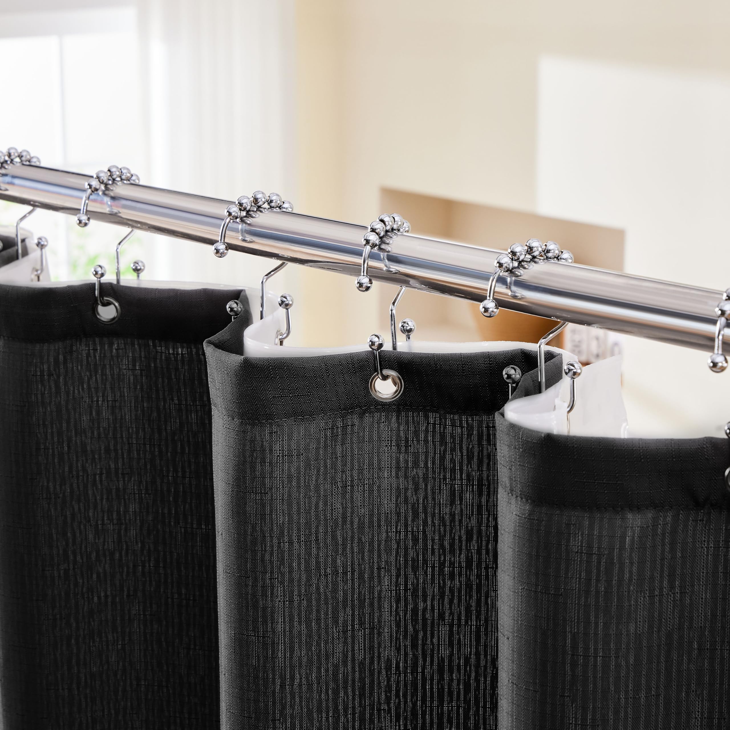 Lameirose 3-in-1 outer curtain shows water-repellent fabric that helps keep floors dry.