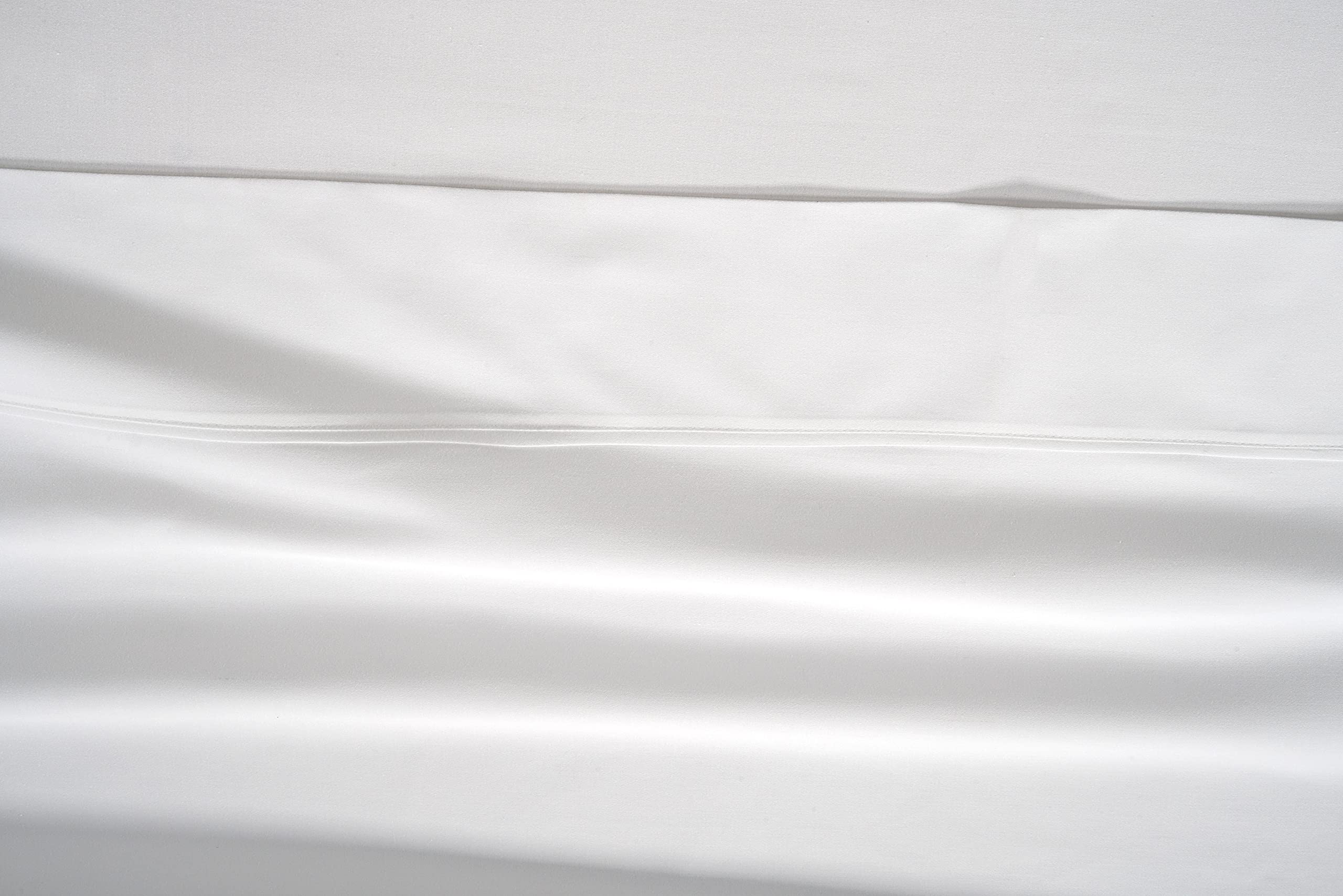 Lane Linen bed with white sheets for a hotel-inspired bedroom look