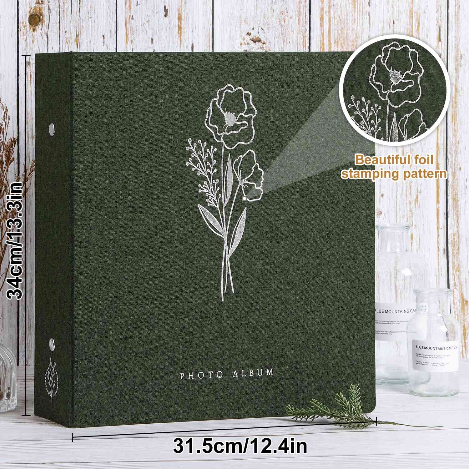 Lanpn photo album with silver-stamped linen cover for elegant presentation.