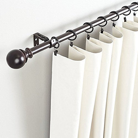 Fabric transformed into a drapery panel using Lansian clip rings.