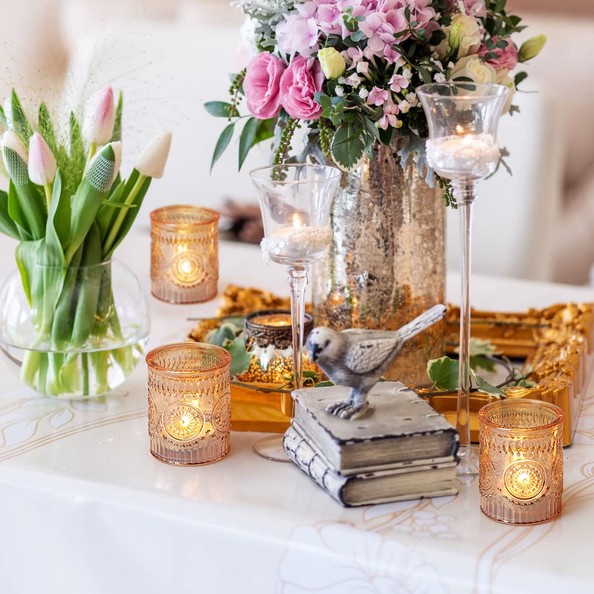 Lanttu candle holders on a table reflect soft candlelight
