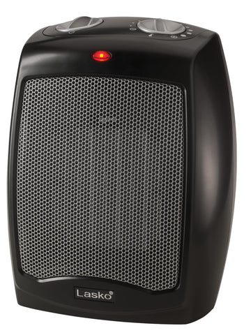 Lasko CD09250 front view showing a compact desk heater in black.