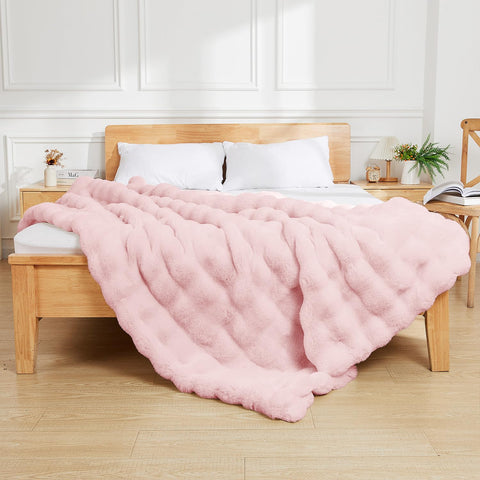 Latepis pink faux fur throw highlighting thick warmth for couch snuggling.