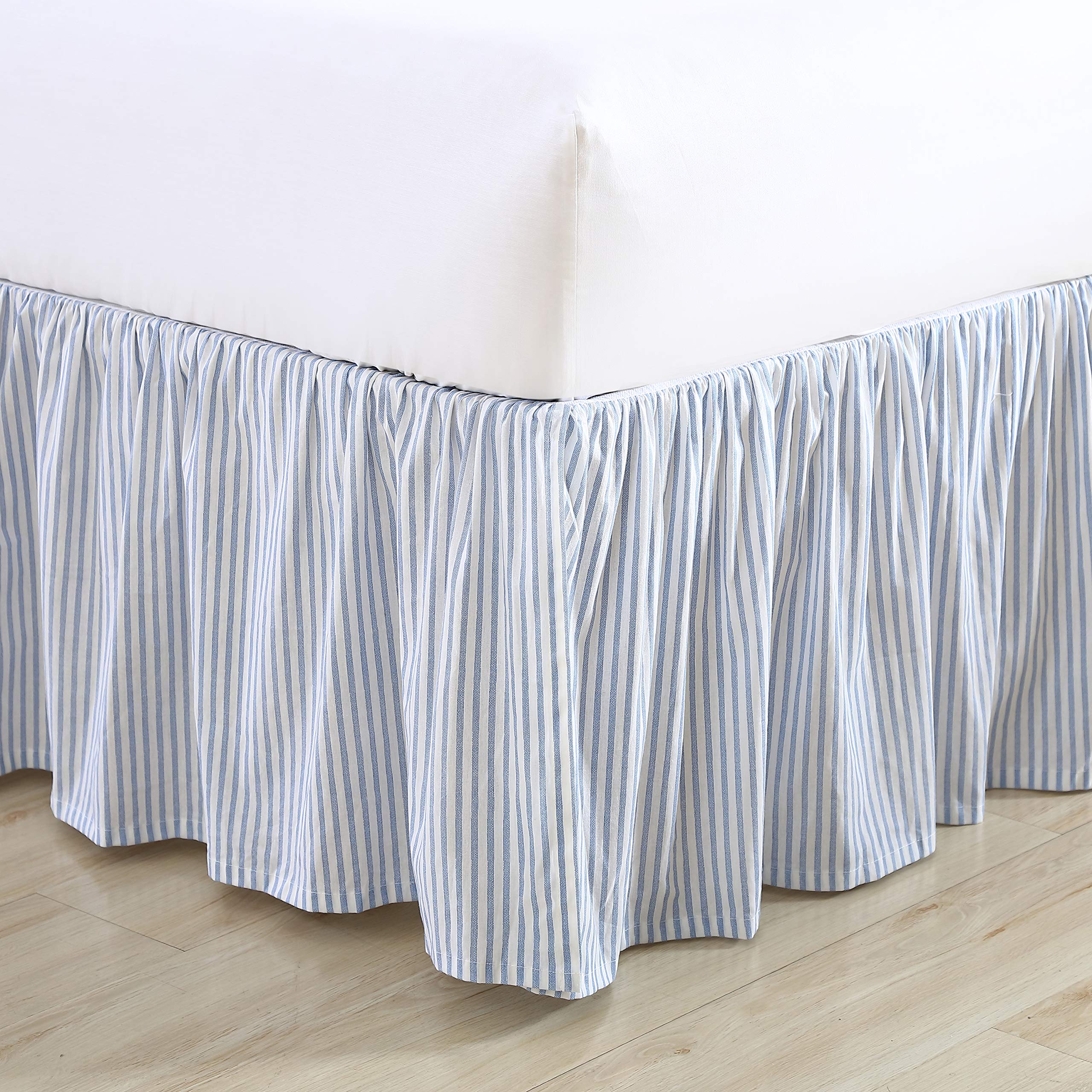Laura Ashley bedskirt with ruffled detail adds soft texture to the bedscape.