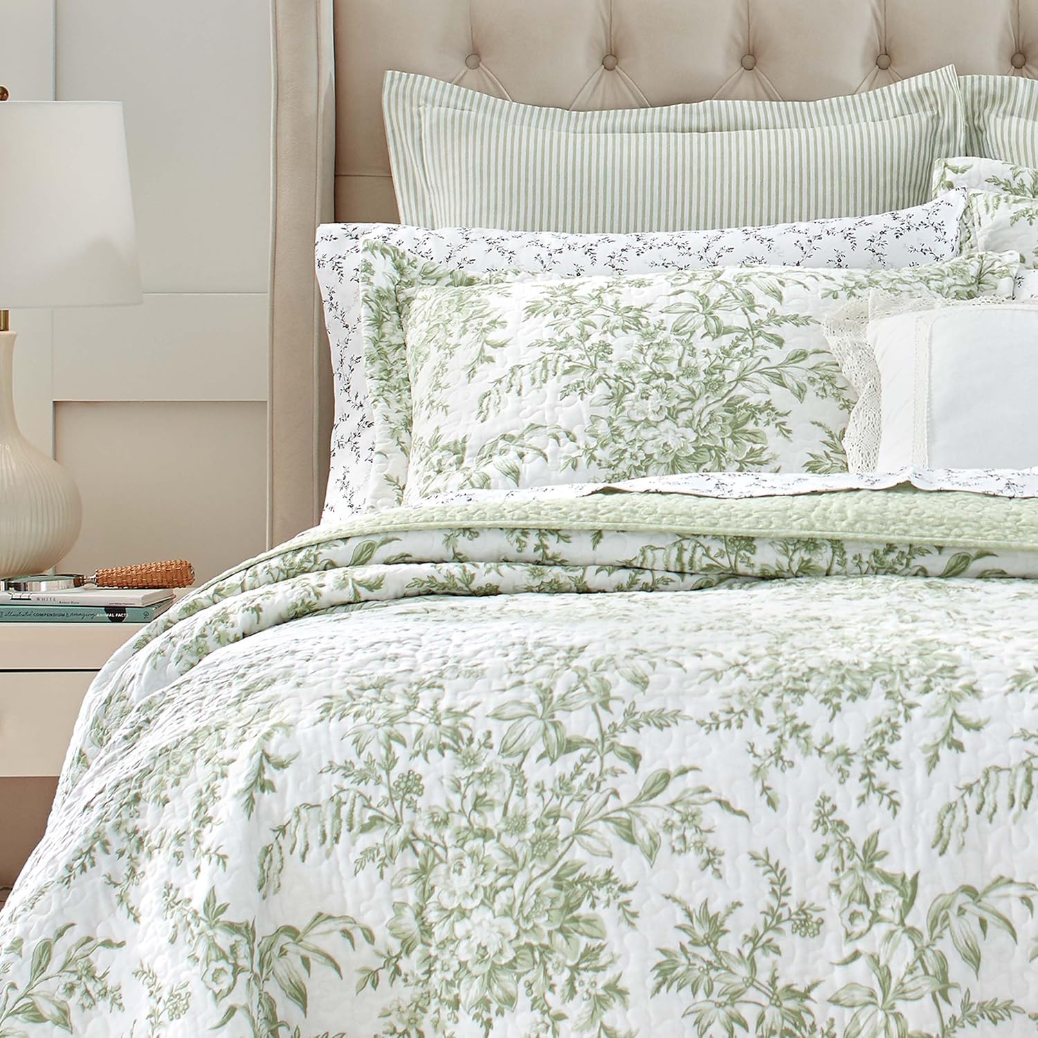 Laura Ashley Queen Quilt Set pillowcase detail for coordinated, easy-care bedding.