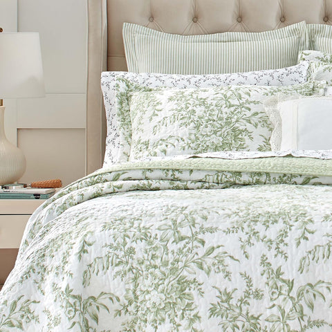 Laura Ashley Queen Quilt Set pillowcase detail for coordinated, easy-care bedding.