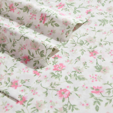 Fitted sheet pocket demonstrates secure fit for deep mattresses.