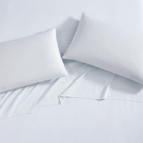 Laura Ashley Queen Ramona Blue flat sheet drape demonstrates light, airy comfort.