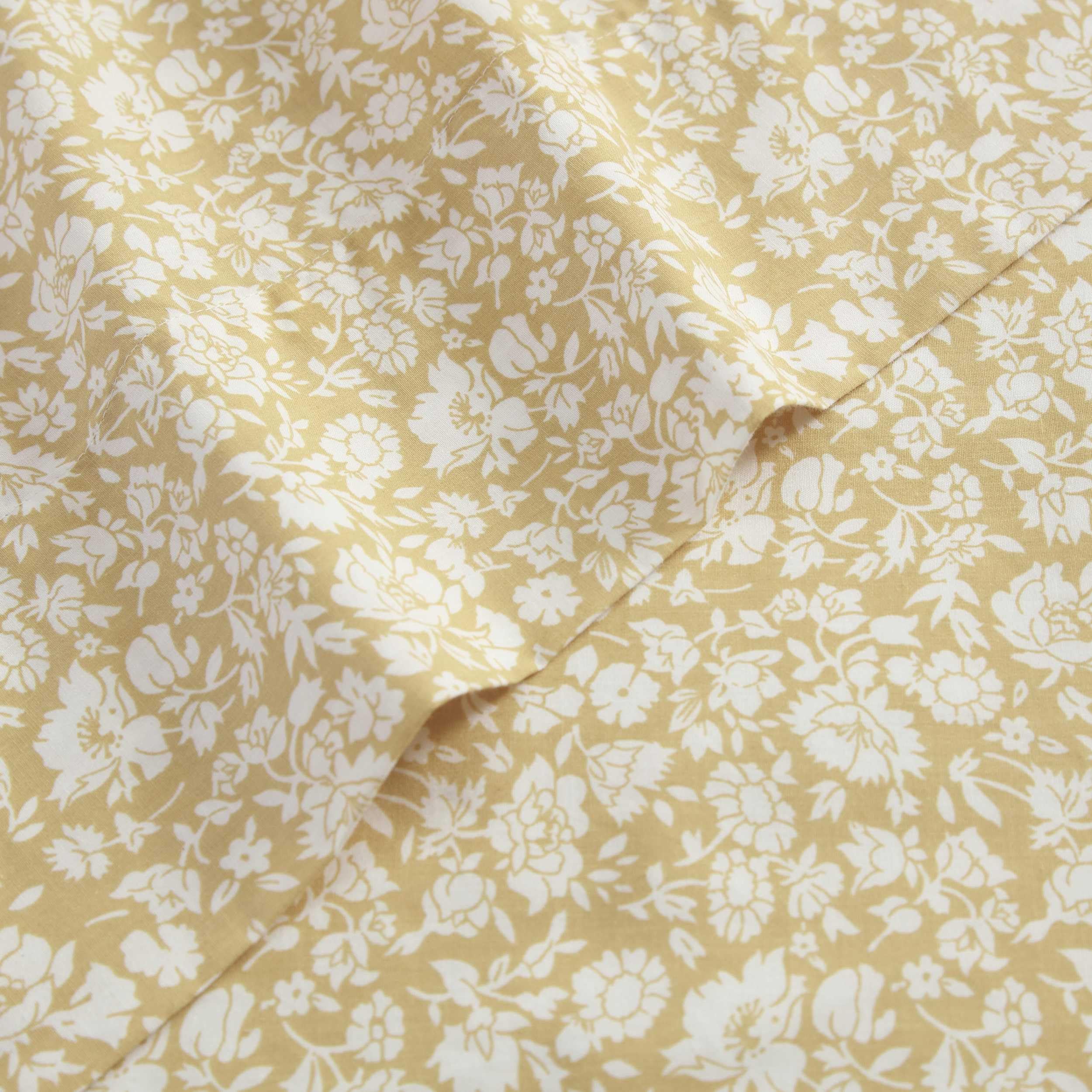 Laura Ashley Queen Percale Gold bed ensemble close-up texture.