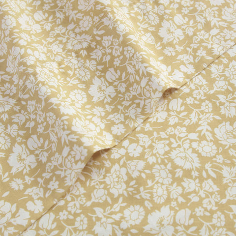 Laura Ashley Queen Percale Gold bed ensemble close-up texture.