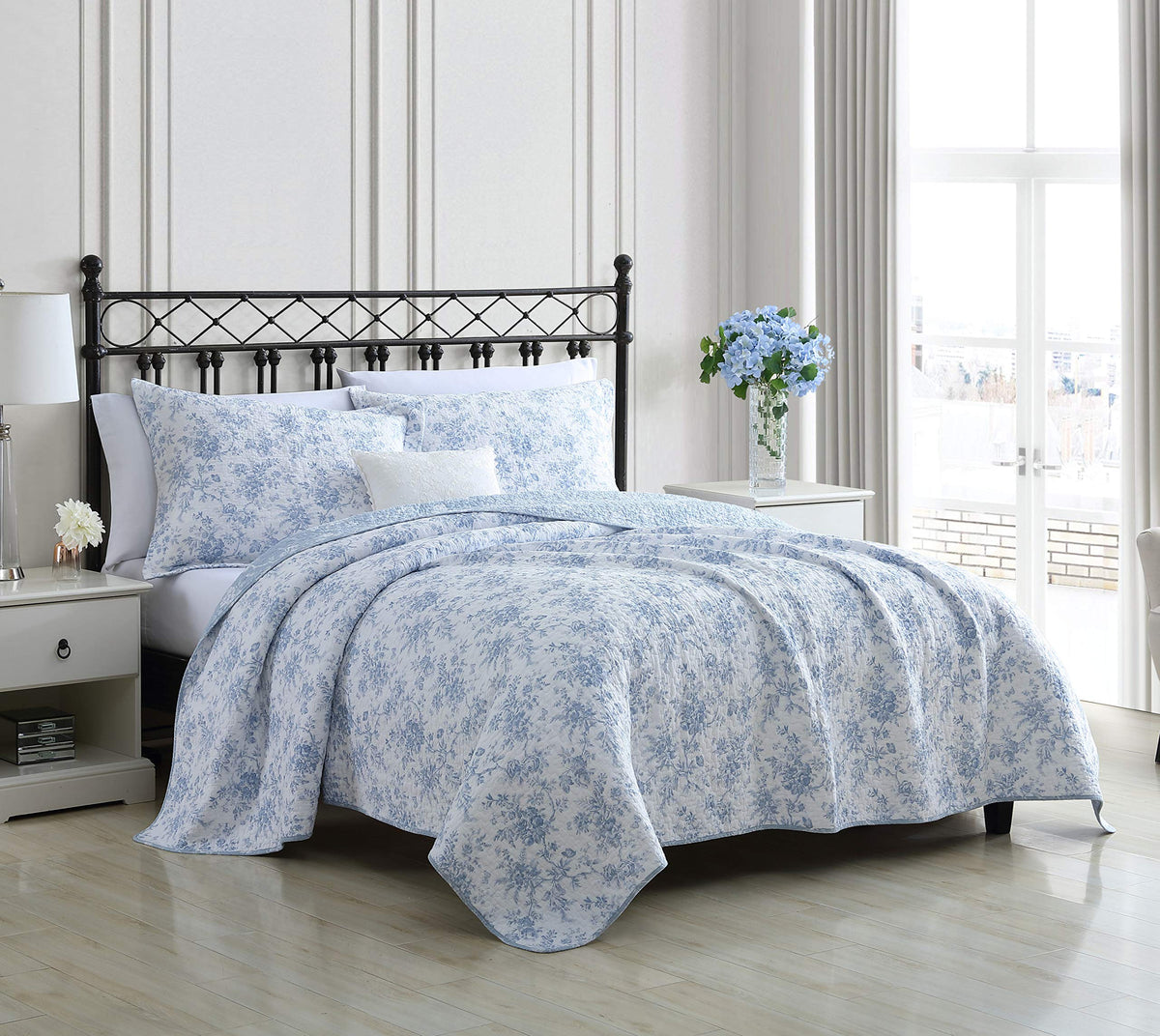 Laura Ashley Walled Garden Blue quilt set closeup showing floral print for a refined bedroom