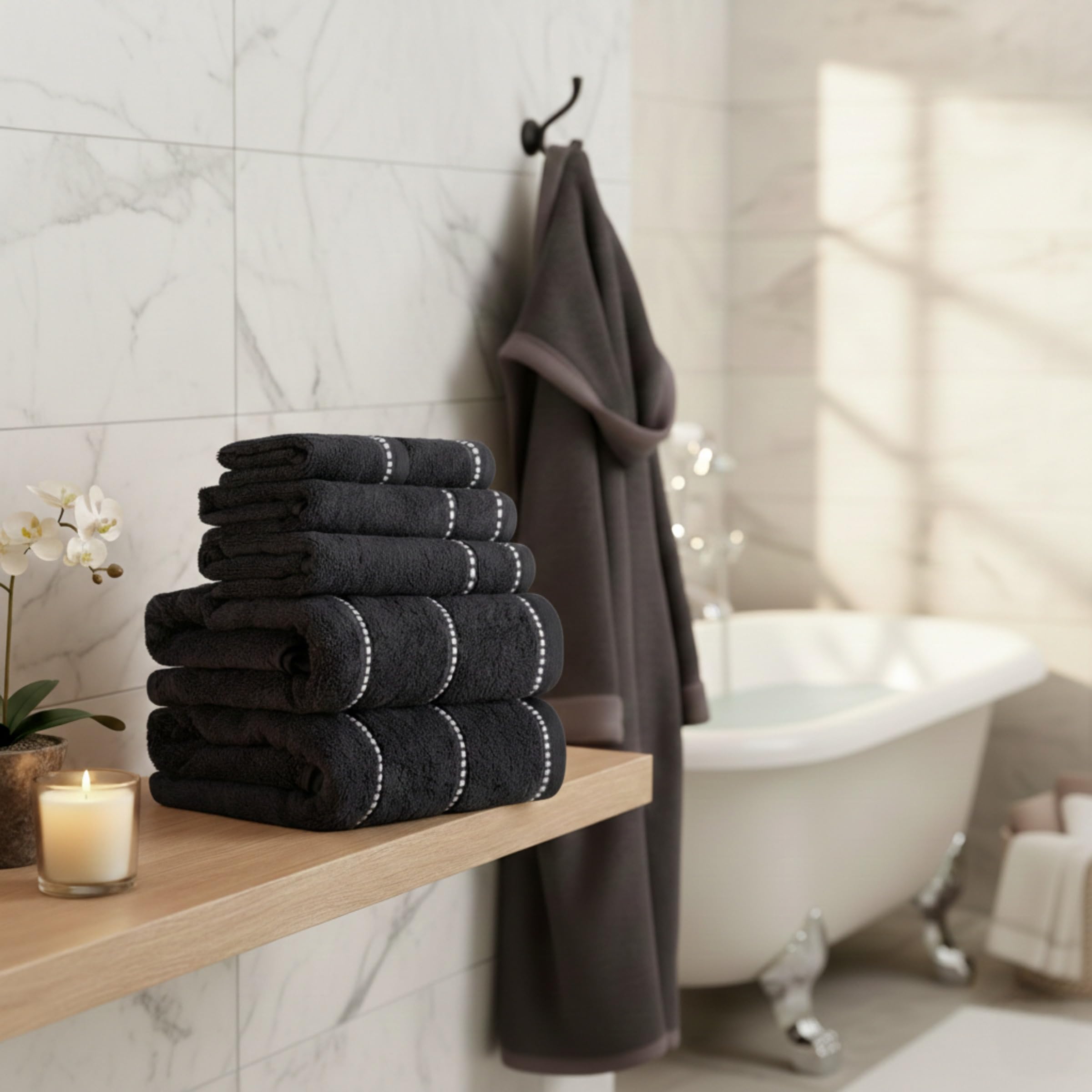 Lavish Home bath towels with pin-stitch border highlighting style and durability.