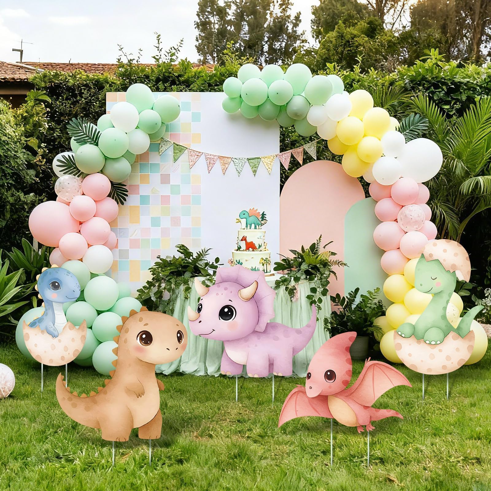 LawnIdyll green dinosaur cutout adds color to gender reveal party backdrops.