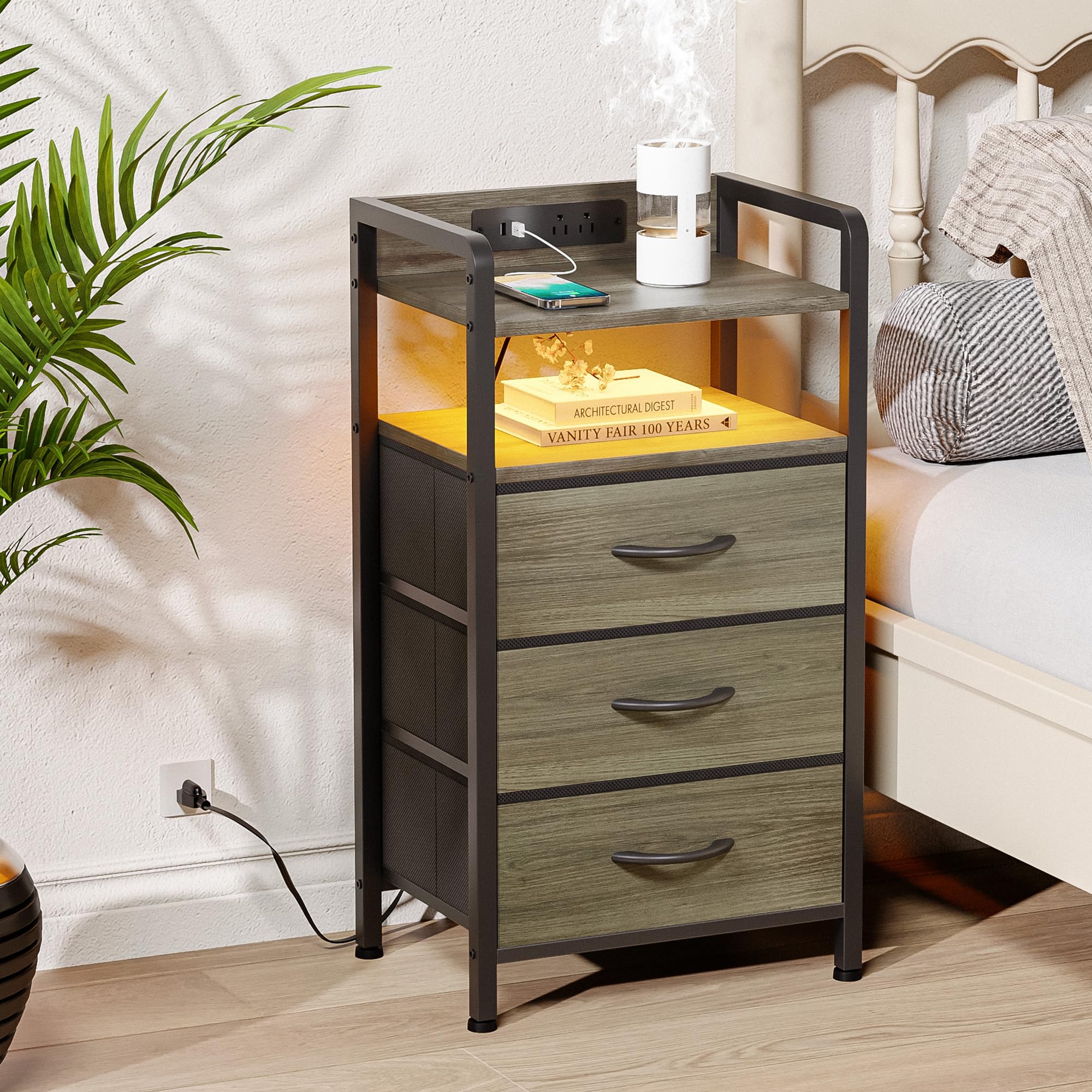 Lazzanto night stand three fabric drawers for organized storage.
