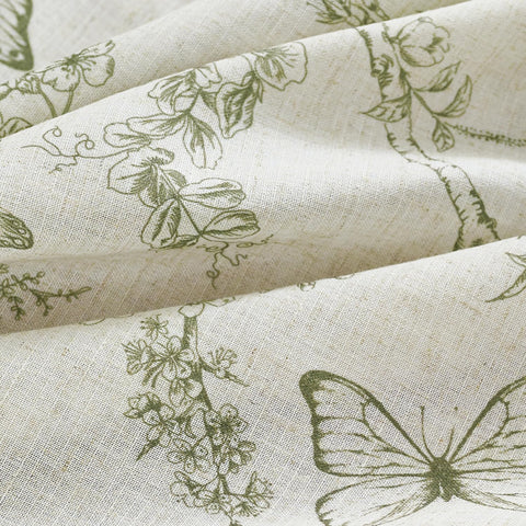 Lazzzy bedroom privacy and soft daylight with botanical linen curtains.