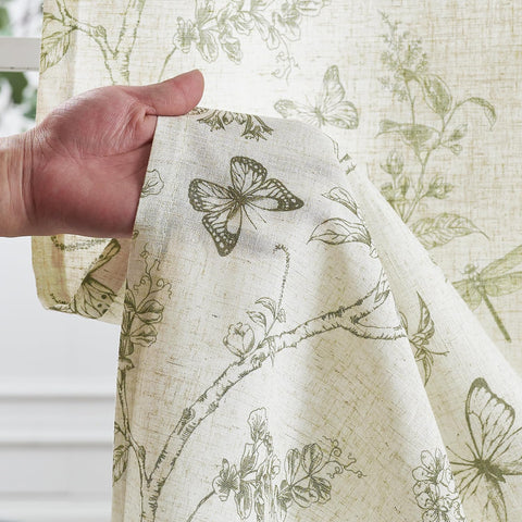 Lazzzy Charlotte green floral curtains on beige background evoke vintage farmhouse.