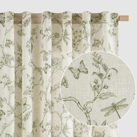 Lazzzy Charlotte linen curtains with green floral print frame a sunlit window for soft light filtering.