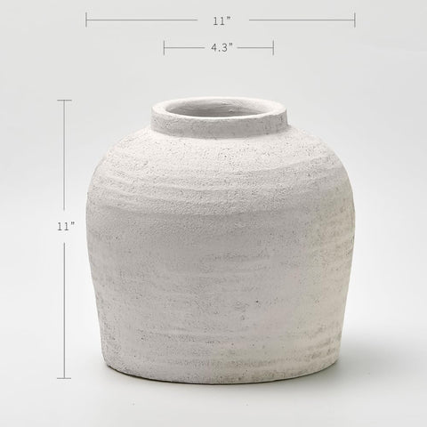 LB2 white ceramic vase elevates living room decor with timeless simplicity.