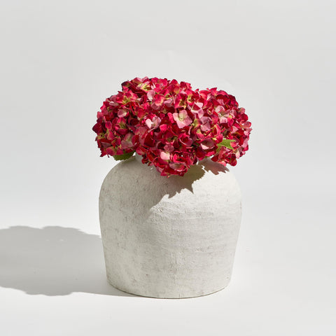LB2 vase with flowers ready for showcasing a centerpiece or accent.