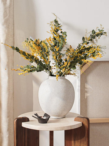 LE TAUCI GARDEN natural clay texture vase adds rustic warmth to shelves.
