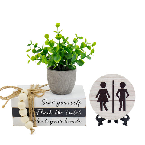 Lebsitey book-stack sign for bathroom decor adds a playful wooden focal point.