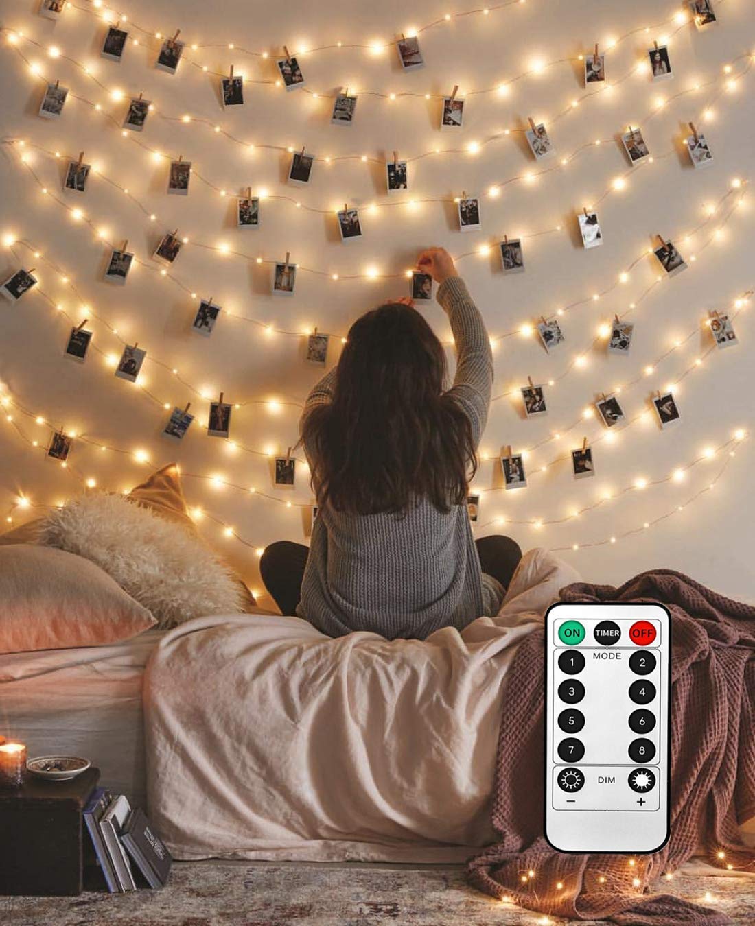 LECLSTAR 50-LED photo clips on a clear strand showcase memories with warm illumination.