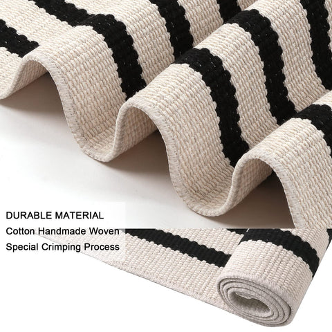 LEEVAN Black and White striped rug for stylish entryways.