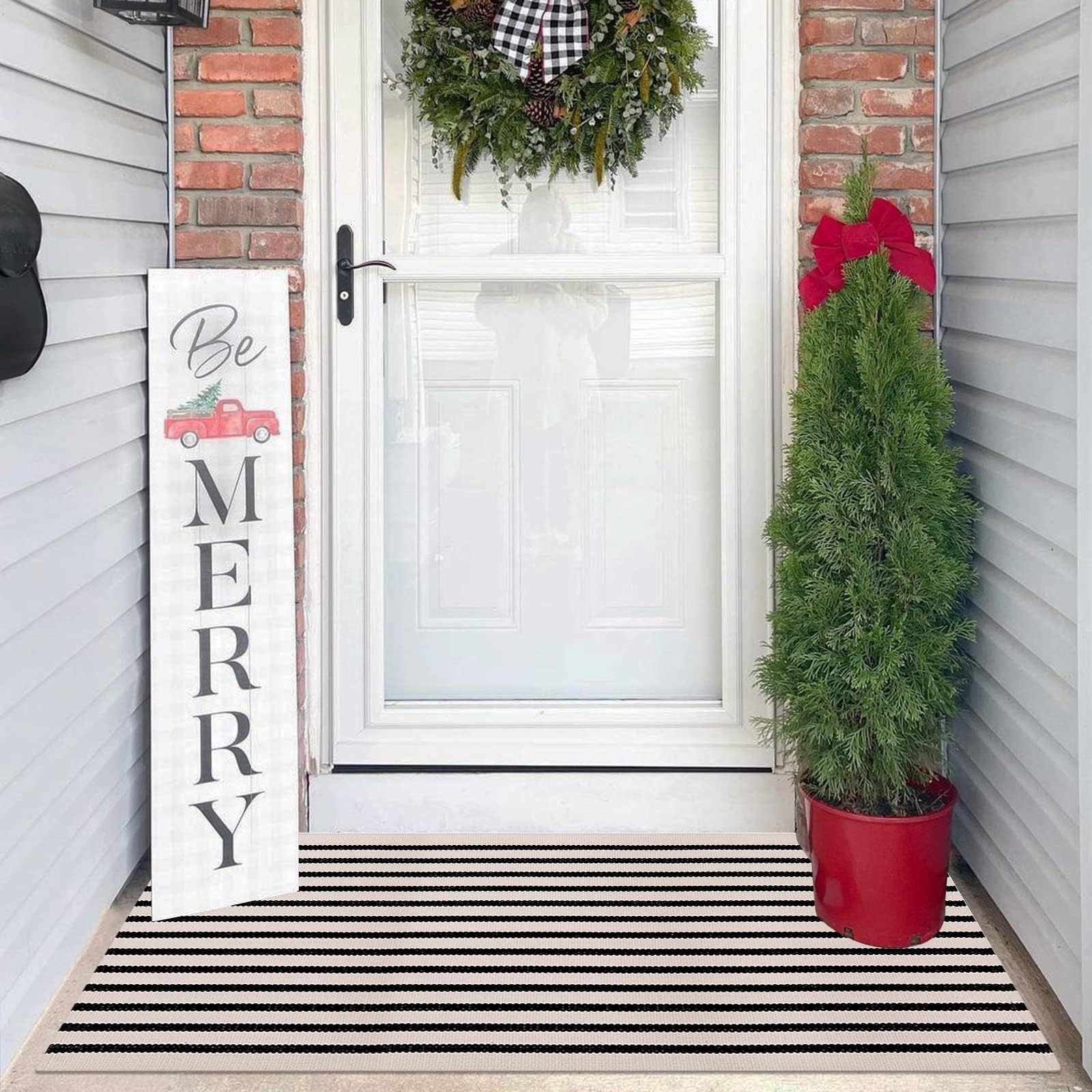 Leevan layering doormat on porch demonstrates versatile seasonal styling.