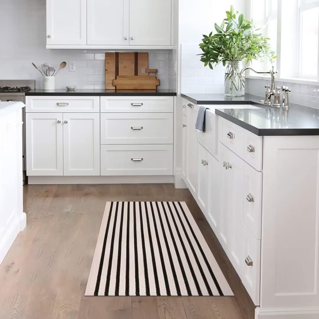LEEVAN Black and White striped rug detail highlighting versatile hallways.