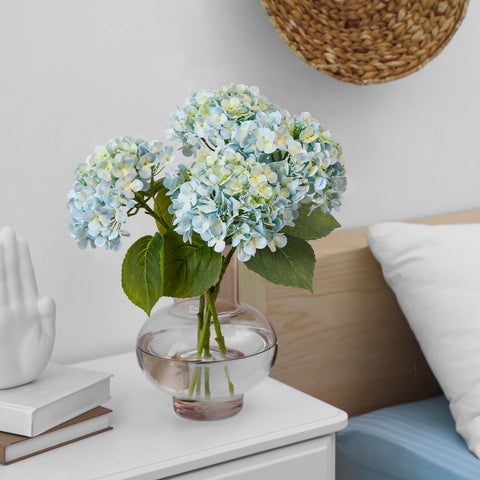 Leftover hydrangea with three butterflies adds whimsical accent.