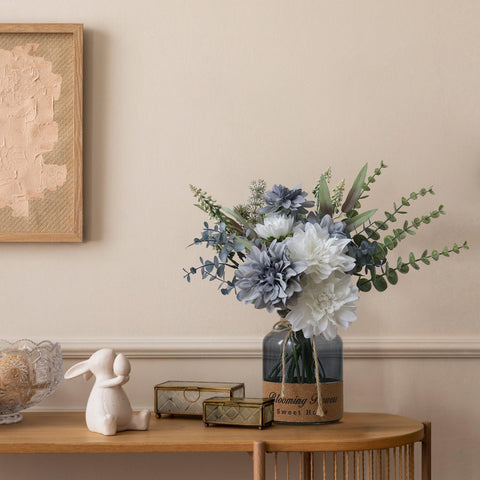 Leftover fake flowers in vase offer flexible styling for any room.