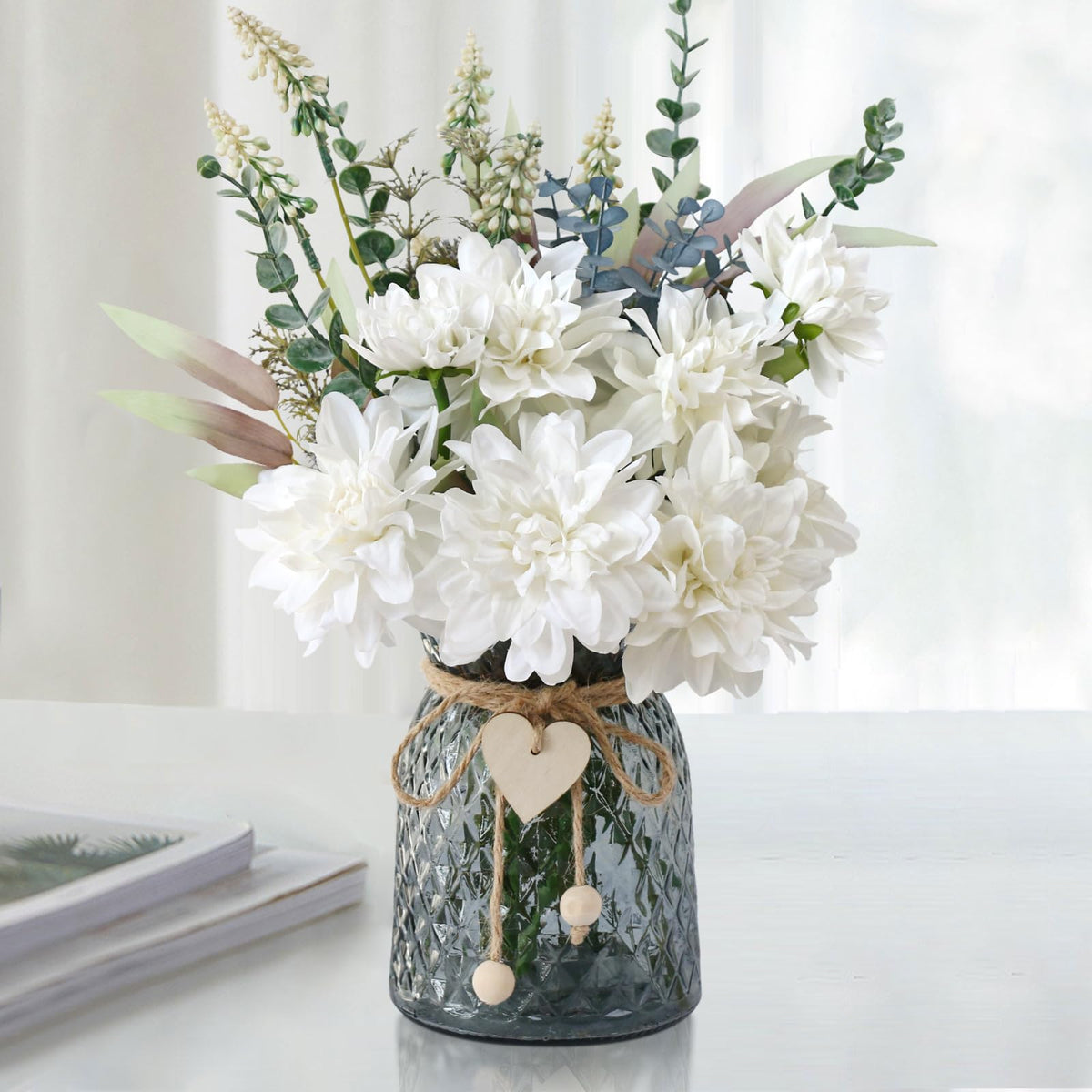 Leftover fake flowers in vase with dahlia heads for a timeless table centerpiece