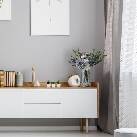 Leftover fake flowers in vase arrive gift-ready and stylish