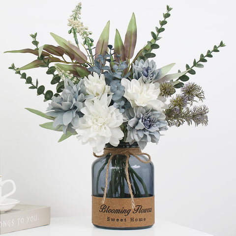 Leftover faux flowers in a vase add lasting color to your living space.