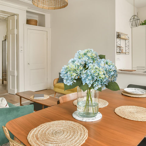 Leftover hydrangea blooms brighten bedroom decor.